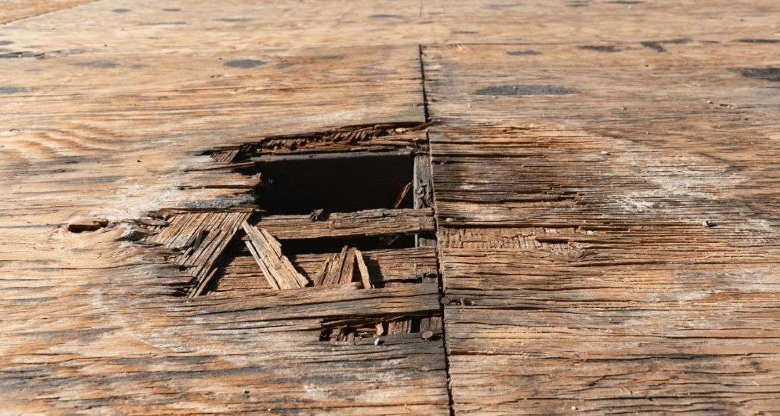 Rotten roof deck exposed during a roof replacement
