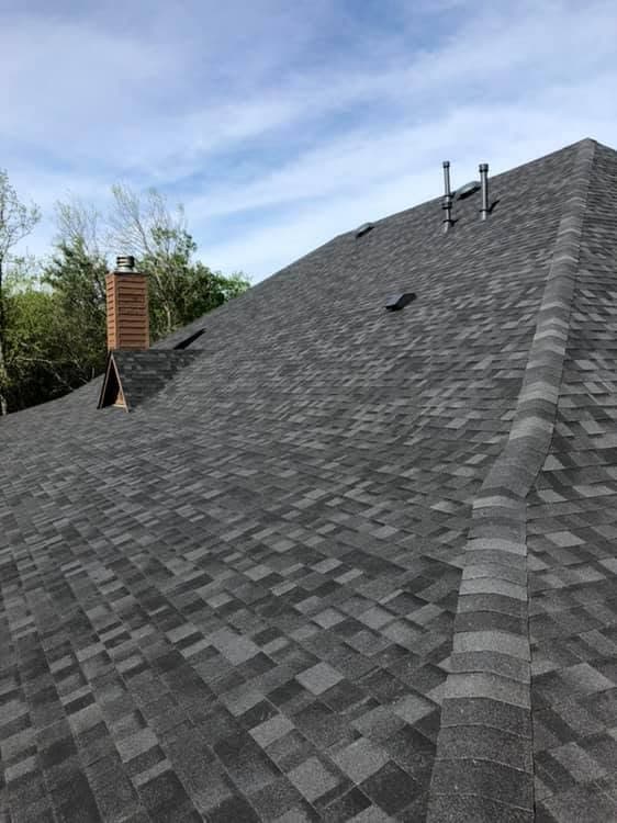 Close-up detail of a finished architectural asphalt shingle roof
