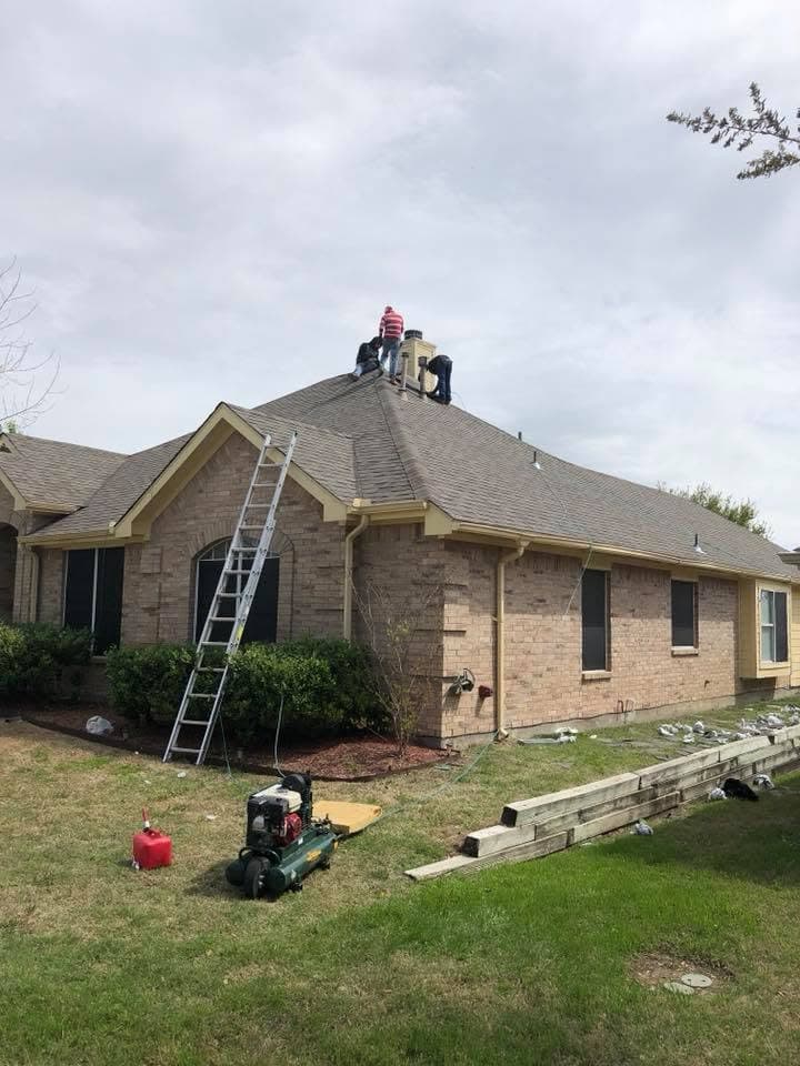 Whitetail Roofing crew at work on a residential roof